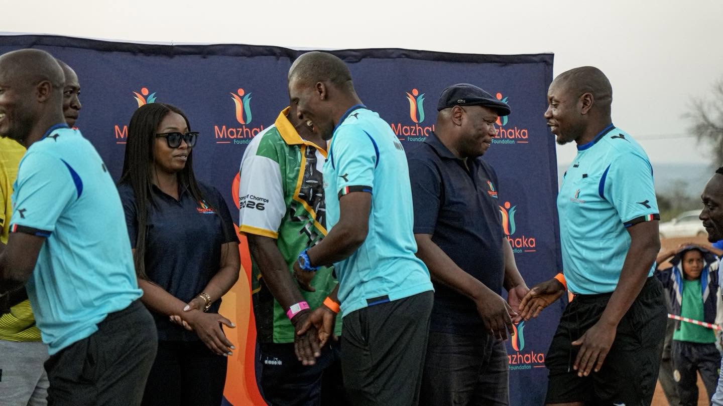 Tournament officials greet one another