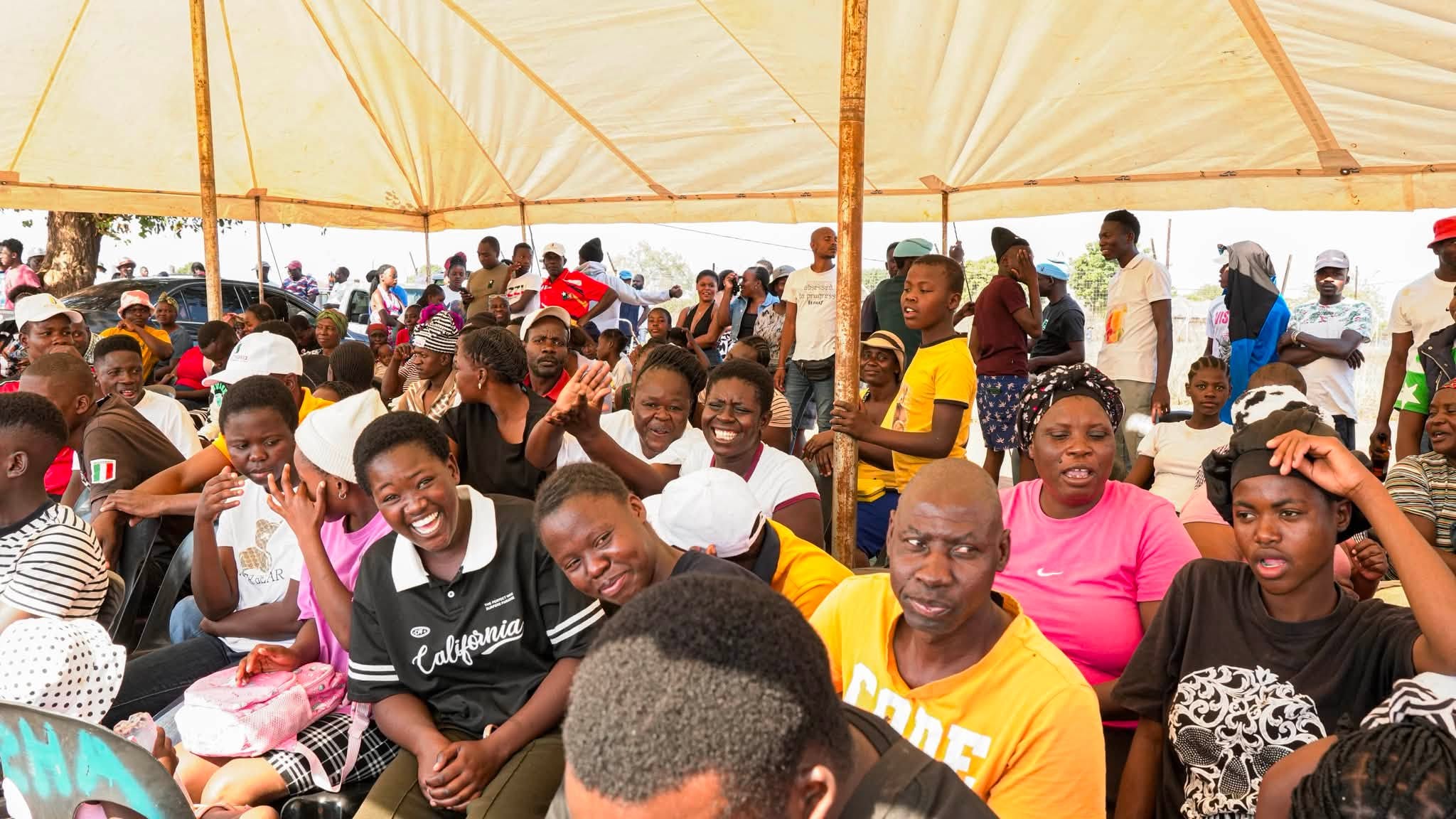 Community members gather outdoors during the event