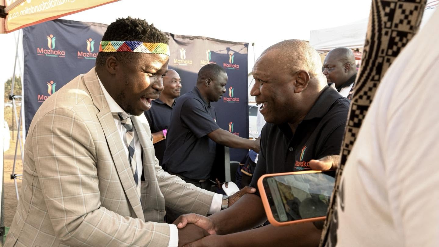 Award presenters share a moment at the ceremony