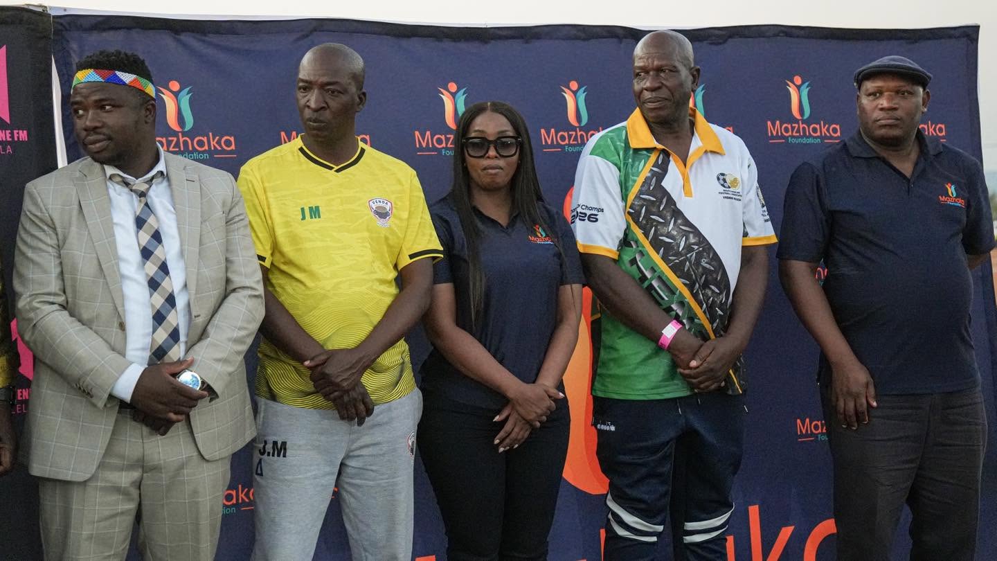 Players and officials pose together at the awards