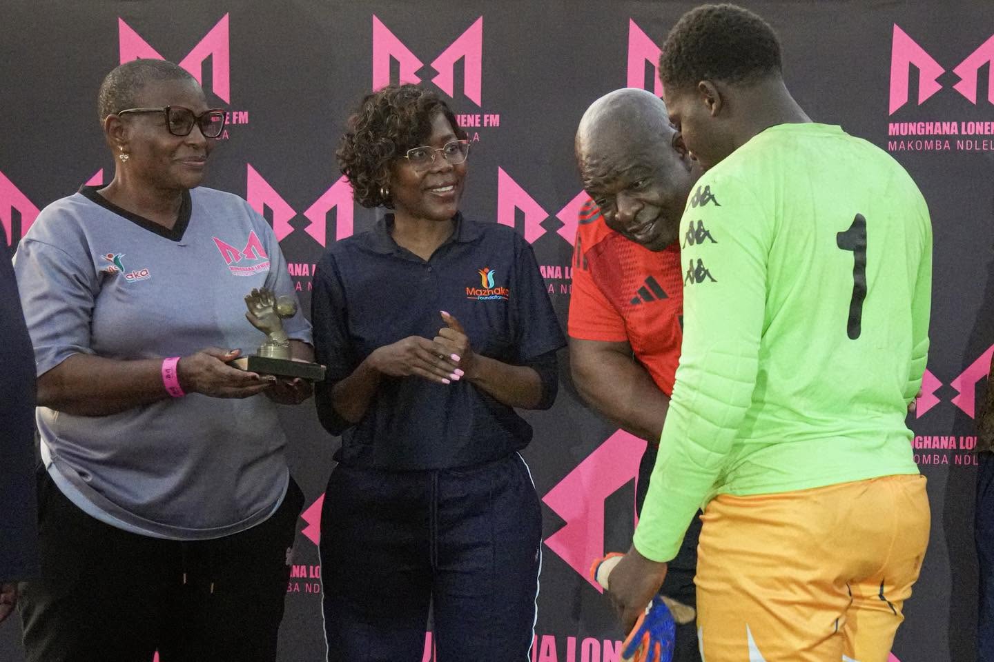 A goalkeeper and team receive recognition