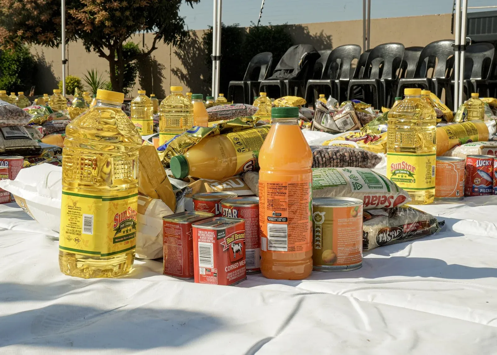 Food supplies laid out for flood-affected families
