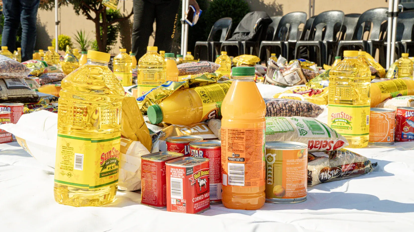 Food parcels laid out on tables for distribution
