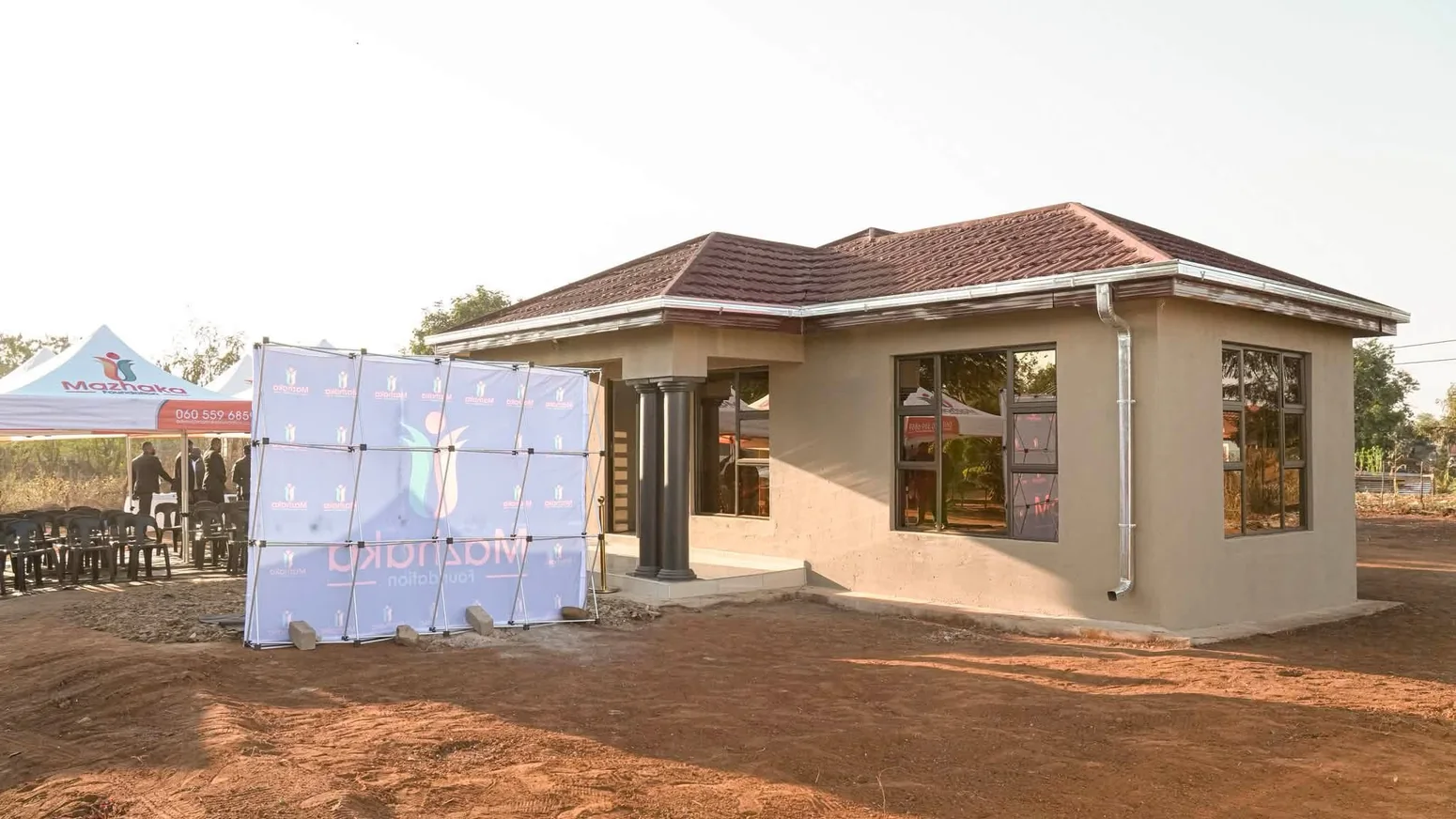 Completed donated home photographed outside at the Mazhaka Foundation handover